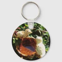 Cast iron birds in the garden keychain