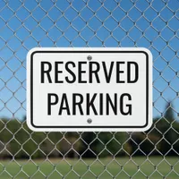 standard black and white reserved parking simple metal sign