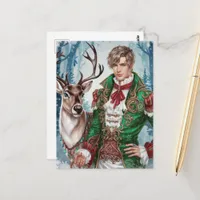 Handsome blond man and a Reindeer Christmas Postcard