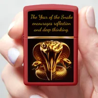 Year of the snake with a golden snake zippo lighter