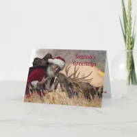 Kissing Santa and Moose Folded Greeting Card