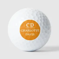 Orange monogram name golf balls