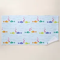 Cute romantic fish in ocean falling in love  beach towel