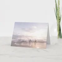 Anniversary card with Couple running On Beach