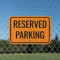 standard black and orange reserved parking simple metal sign