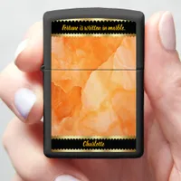 A close-up view of vibrant orange marble patterns zippo lighter