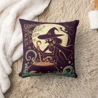 Witch creating potions under a glowing moon throw pillow