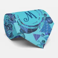 Modern geometric shapes with monogram in blue neck tie