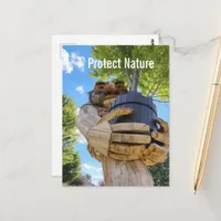 A Surreal Troll Holds Up a Tree to Protect Nature Postcard