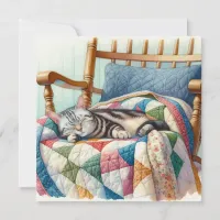 Sweet Gray Cat Sleeping on a Quilt