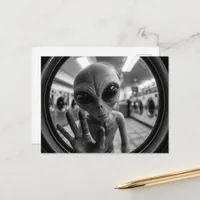 An alien at the laundromat black and white postcard