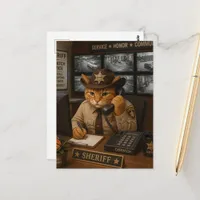 An adorable cat sheriff in the dispatch office postcard