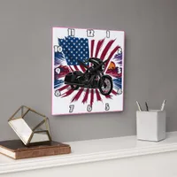 Bold bike with vibrant flag backdrop square wall clock