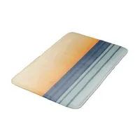 Fading Orange Sunset over Blue Ocean Waves Bath Mat