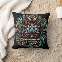 Floral and feather design on dark throw pillow