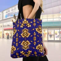 Elegant golden roses on royal blue tote bag