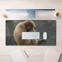 Fluffy white-handed lar gibbon desk mat