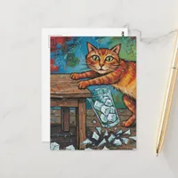 A cute ginger cat knocks over a glass of ice postcard