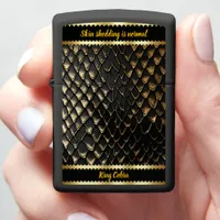 Glistening black and gold snake skin zippo lighter