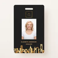 Photo logo black gold city skyline real estate badge