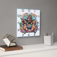 Fun-loving gorilla celebrating on a skateboard square wall clock