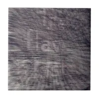 Abstract Ghost Sign on Brick Building Tile