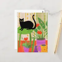 Black Cat on a Green Chair Postcard