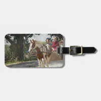 Pinto and children in buggy luggage tag