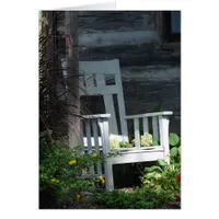 White Wooden Chair in a Garden