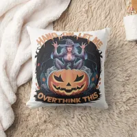 Enigmatic witch pondering atop a pumpkin at dusk throw pillow