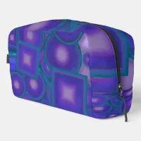 Geometric Harmony in Blues and Purples Dopp Kit