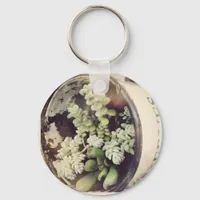 A cup full of succulent plants keychain