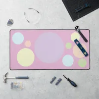 Pastel circles on a pink background | desk mat