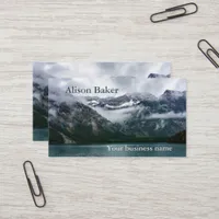 Snowy mountains in the fog at Plansee lake  Business Card