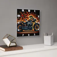 Fiery motorcycle blazing against a dark backdrop square wall clock