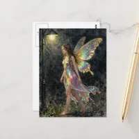 Fairy in a colorful dress in the night rain postcard