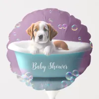 Cute puppy in a bathtub with bubbles, baby shower balloon