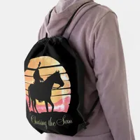 Chasing the Sunset - Minimalist Cowboy Silhouette Drawstring Bag