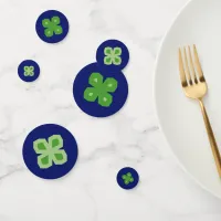 Geometric Four-Leaf Clovers on Blue Confetti