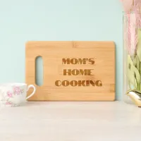 Minimalist 3-Line Block Text 'Mom's Home Cooking' Engraved Cutting Board