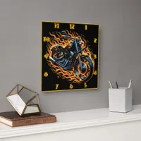 Fiery motorcycle in motion during sunset square wall clock