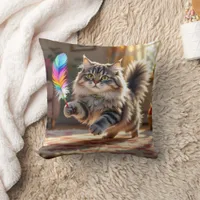 A Cute Fluffy Cat Chasing a Feather Throw Pillow