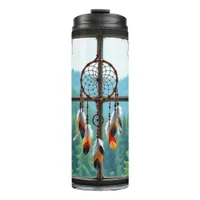 A Dreamcatcher in a Window overlooking Mountains Thermal Tumbler