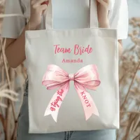 She's tying the knot pink bow Team Bride Tote Bag