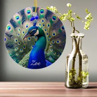 Gorgeous peacock with teal and gold plumage ceramic ornament