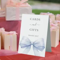 Blue bow white cards gifts sign