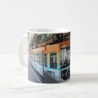 Orange Blue Wuppertal Floating Train Coffee Mug