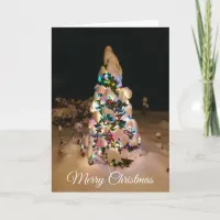 Pretty Lit up Christmas Tree Covered in Snow Card