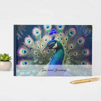 Gorgeous peacock with teal and gold plumage guest book