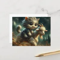 adorable grey kitten riding a goat postcard